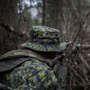 Soldier pointing his gun